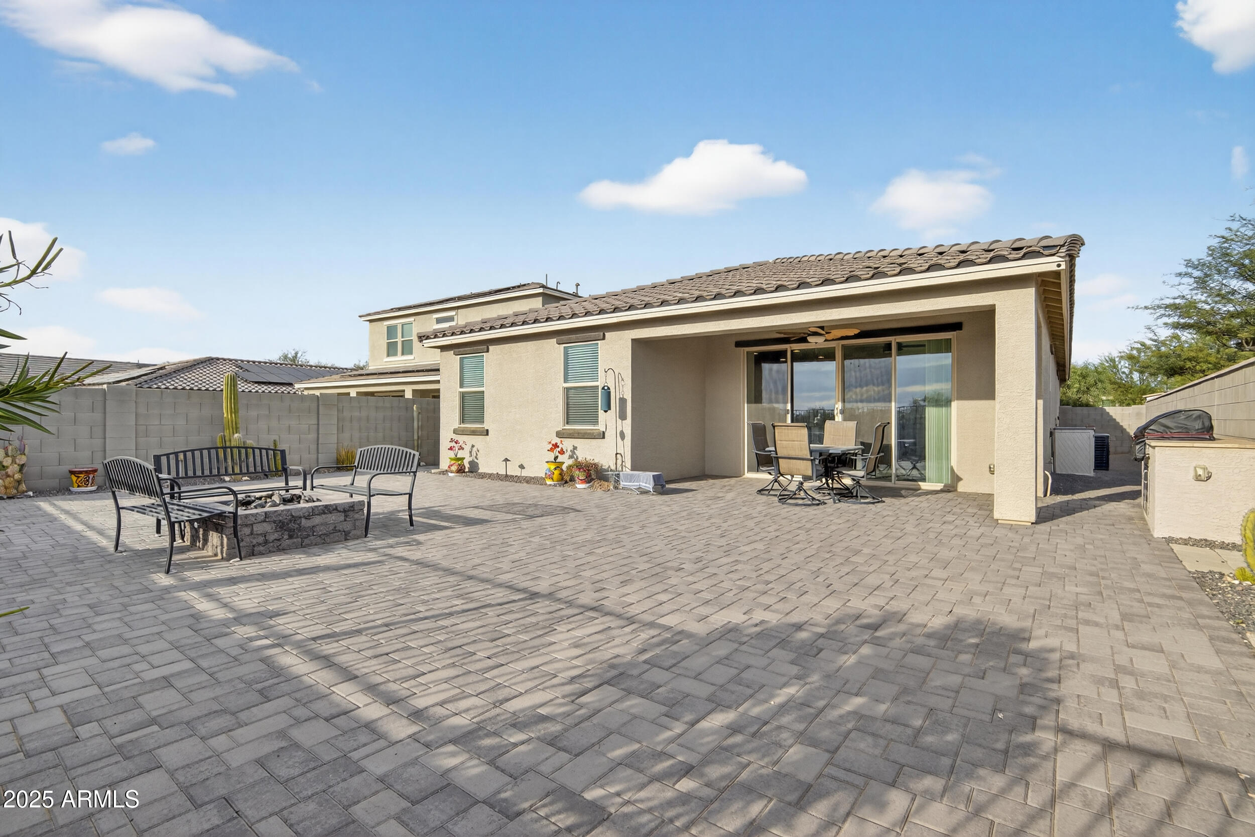 17763 West Granite View Drive Goodyear, AZ 85338 - Photo 40 of 67 a view of a dinning table and chairs in the patio