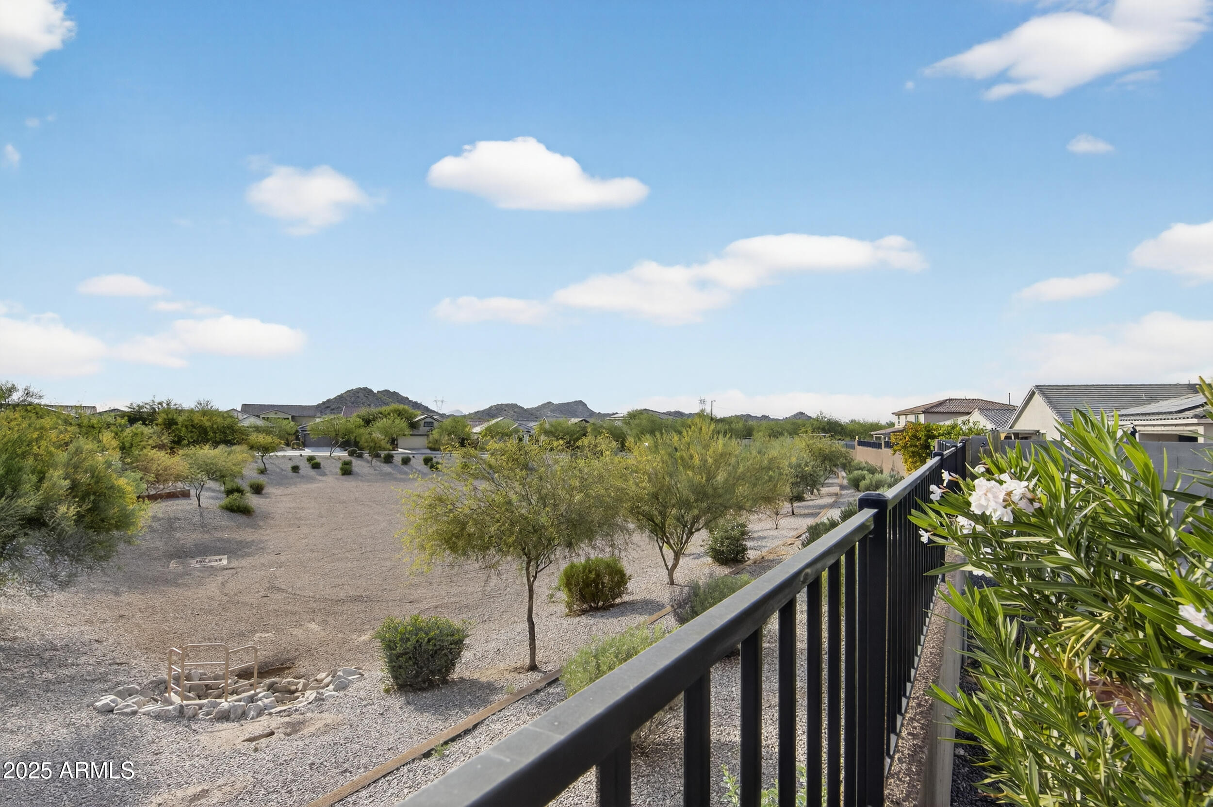 17763 West Granite View Drive Goodyear, AZ 85338 - Photo 45 of 67 a view of a city from a balcony