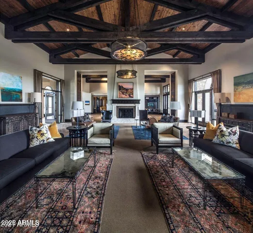 a view of a swimming pool with a yard