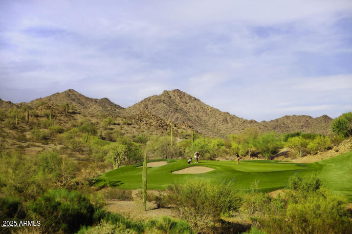 17763 West Granite View Drive Goodyear, AZ 85338 - Photo 54 of 67 a view of a lush green hillside and houses