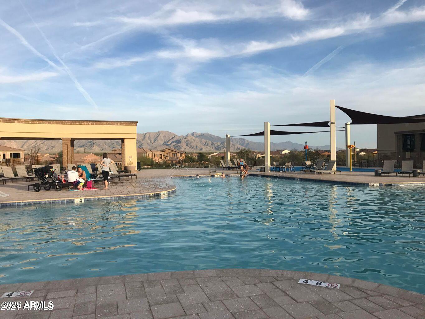 17763 West Granite View Drive Goodyear, AZ 85338 - Photo 63 of 67 a view of swimming pool with outdoor seating