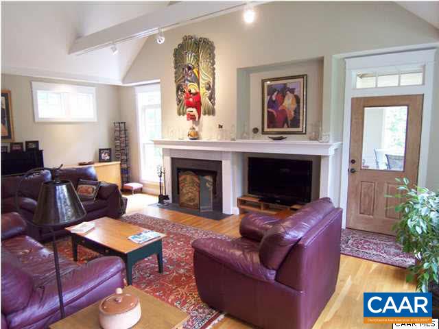 1356 Secretarys Road Charlottesville, VA 22902 - Photo 39 of 45 Living room with fireplace and TV recess