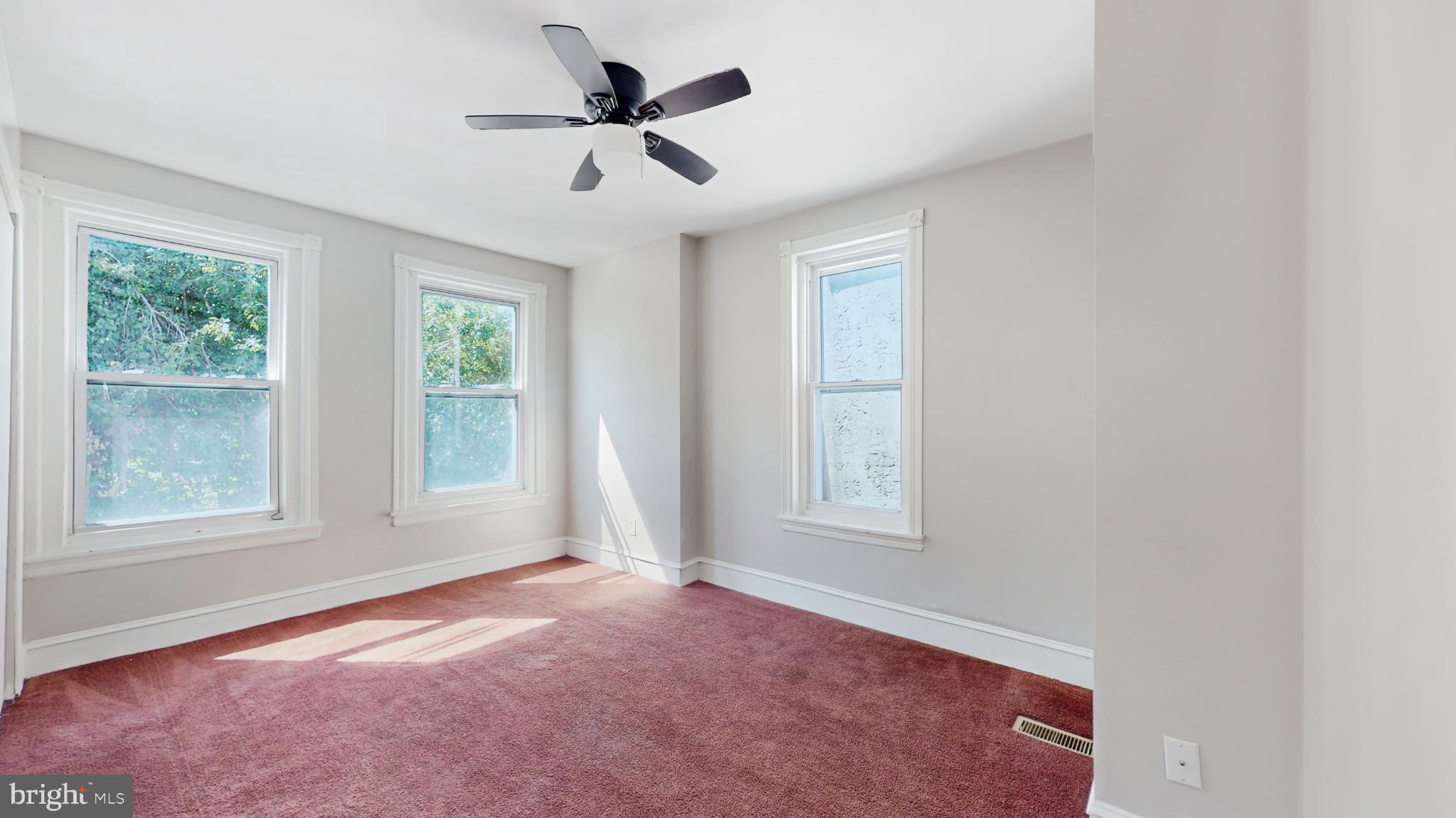 6038 Sansom Street Philadelphia, PA 19139 - Photo 11 of 22 Bright and airy room with charming windows.