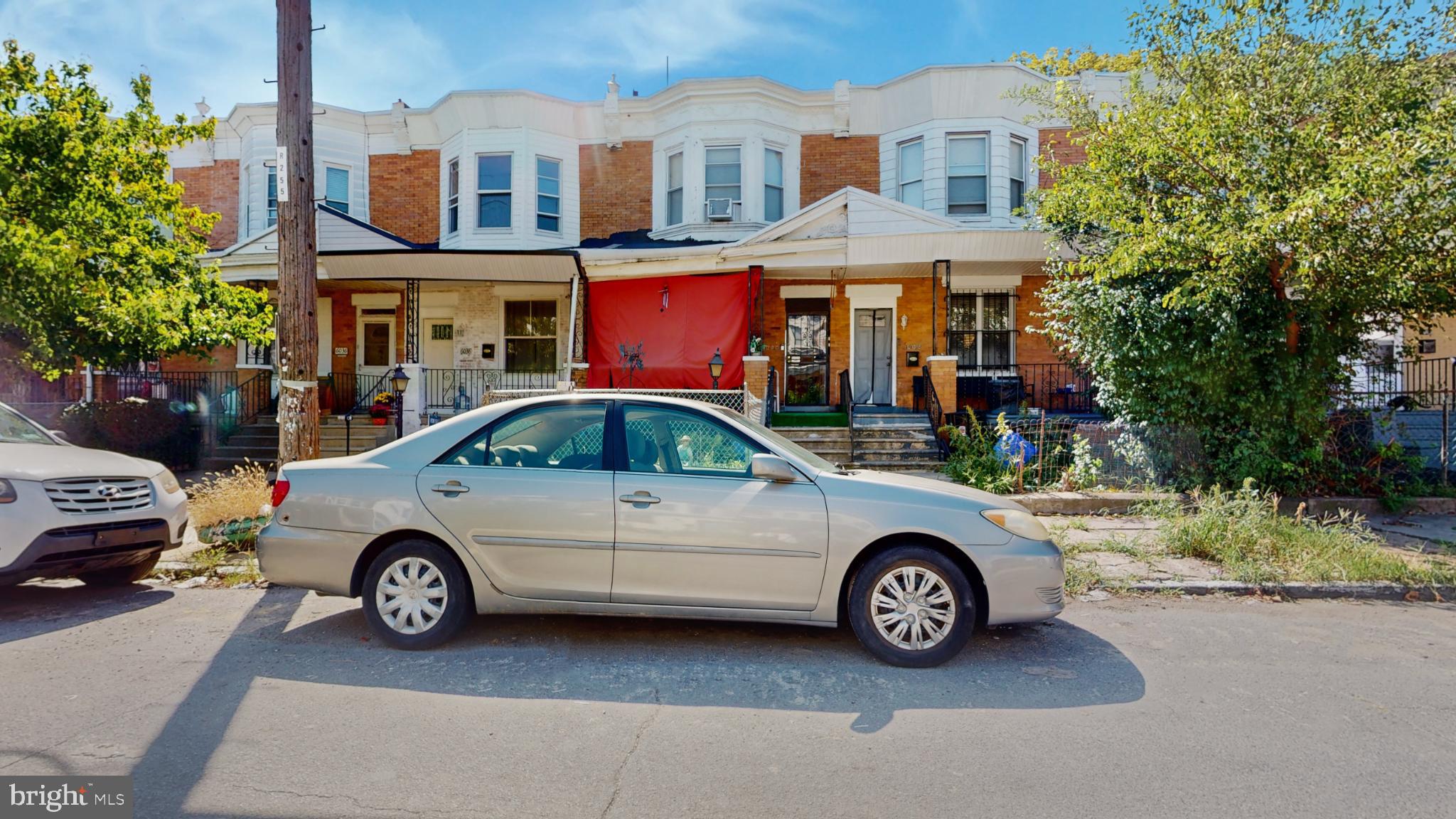 6038 Sansom Street Philadelphia, PA 19139 - Photo 22 of 22 Charming row homes with vibrant facades.