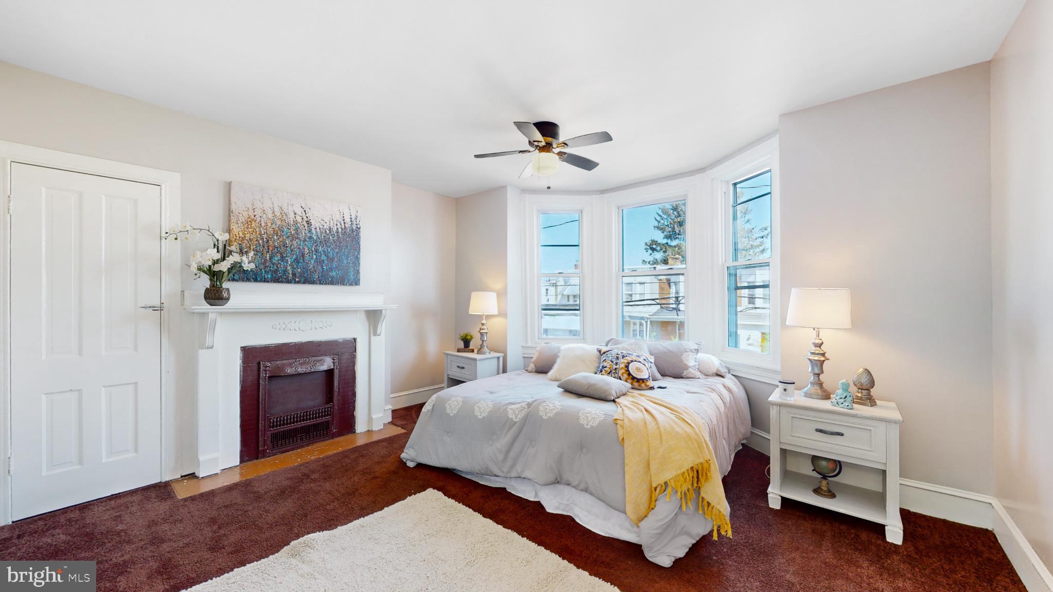 6038 Sansom Street Philadelphia, PA 19139 - Photo 9 of 22 Bright and inviting bedroom with bay windows.