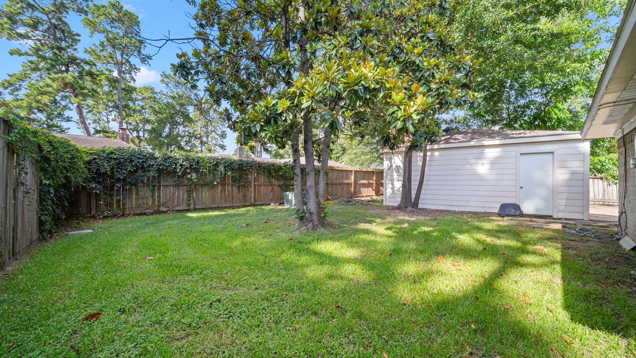 9631 Crail Drive Spring, TX 77379 - Photo 25 of 29 Back yard with detached garage