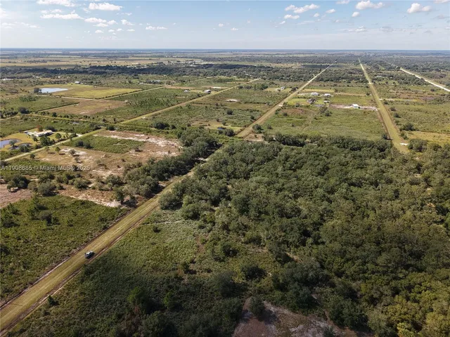a view of a city with an ocean view