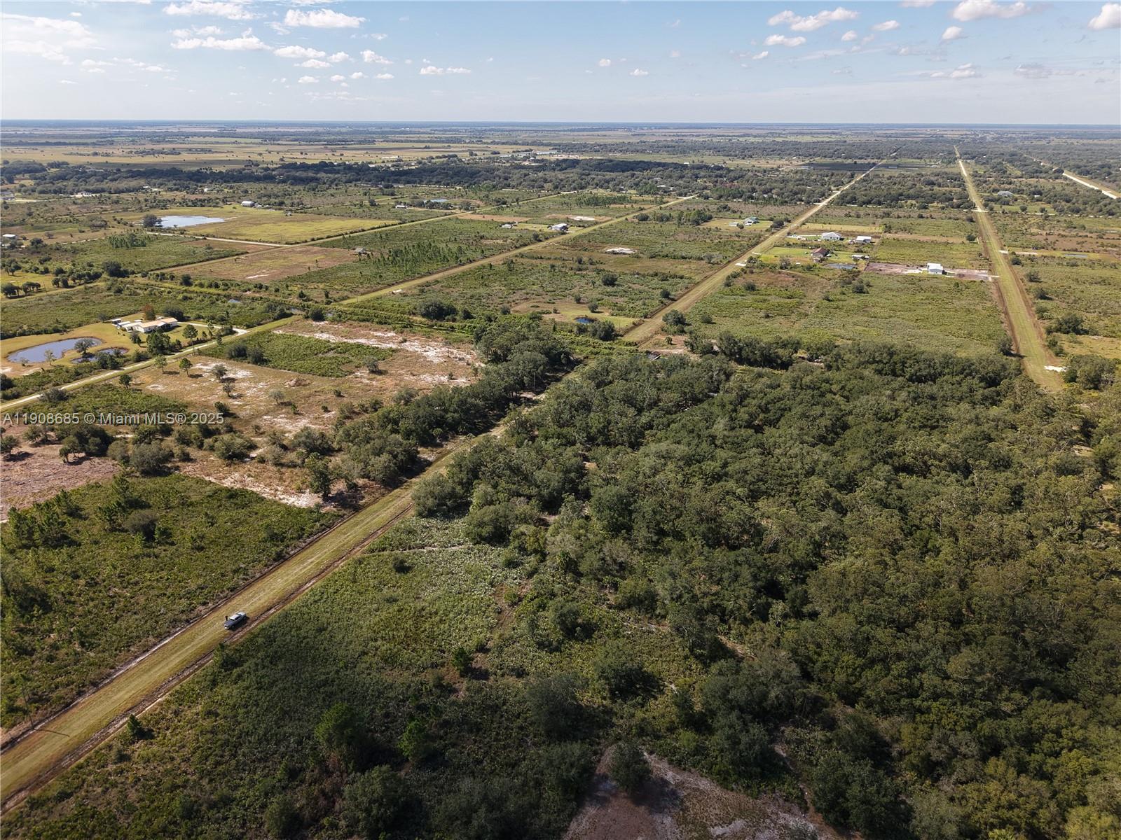 15527 Northwest 252nd Street Okeechobee, FL 34972 - Photo 19 of 32 a view of an ocean and beach