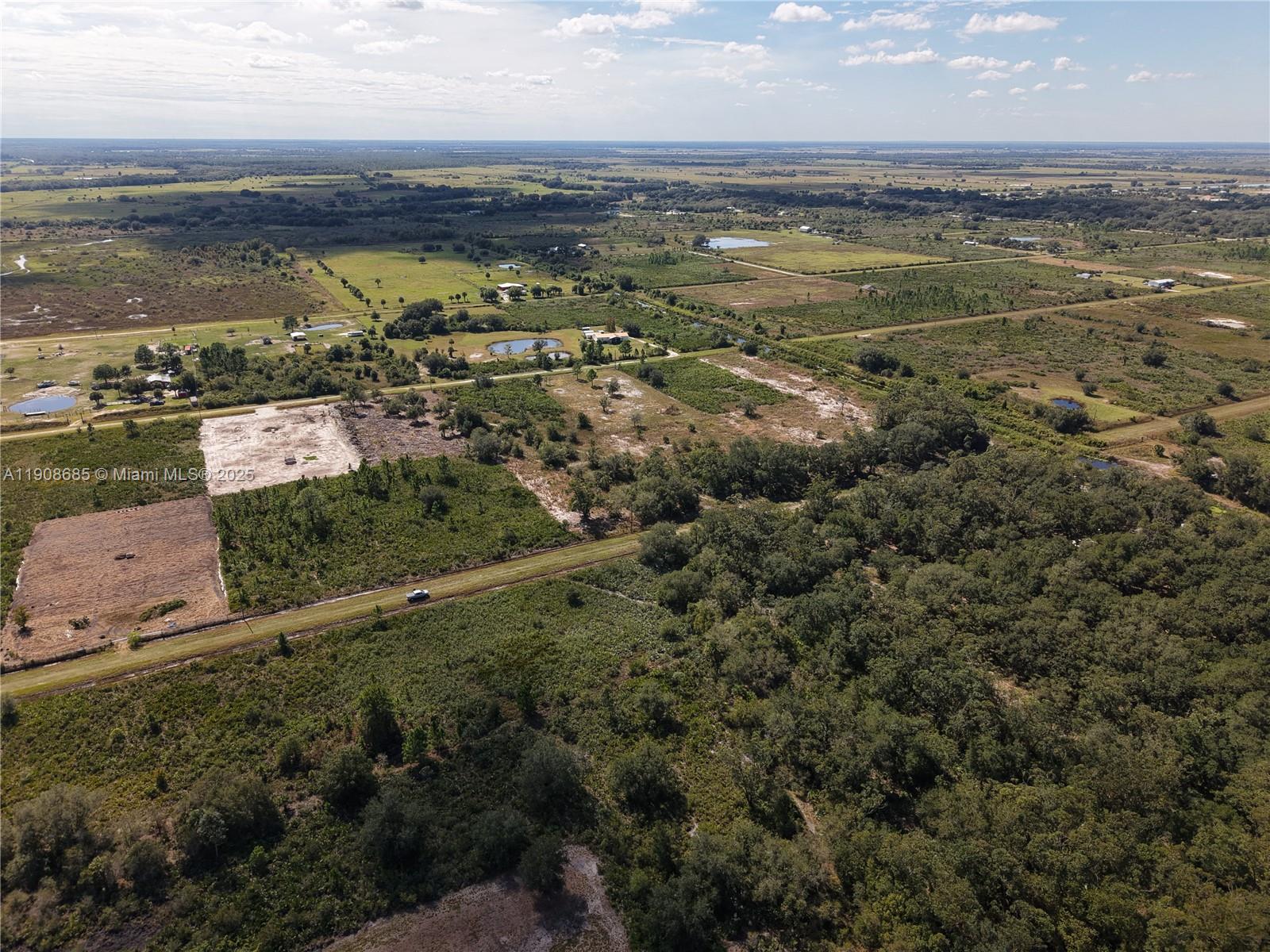 15527 Northwest 252nd Street Okeechobee, FL 34972 - Photo 20 of 32 a view of an ocean and beach