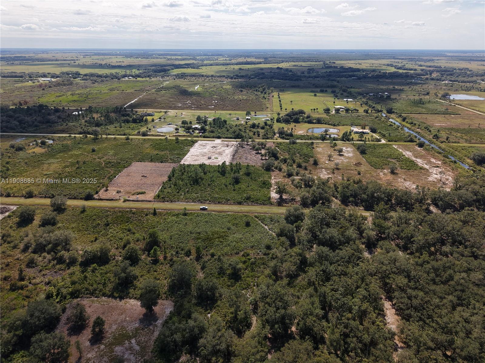 15527 Northwest 252nd Street Okeechobee, FL 34972 - Photo 21 of 32 a view of a city with an ocean view