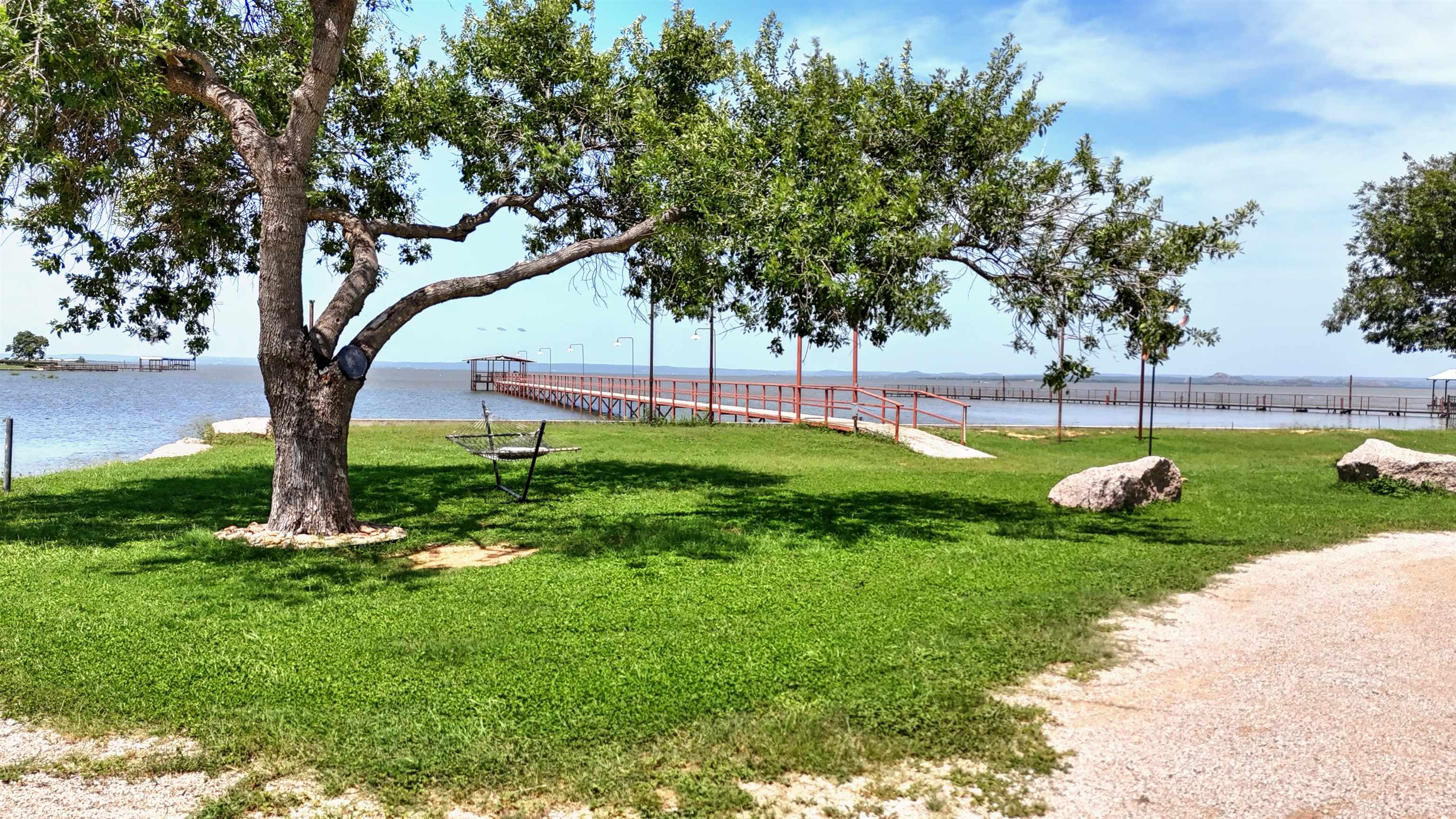 1504 Rr 261 - Main Home Buchanan Dam Buchanan Dam, TX 78609 - Photo 25 of 30 a view of a park with a tree
