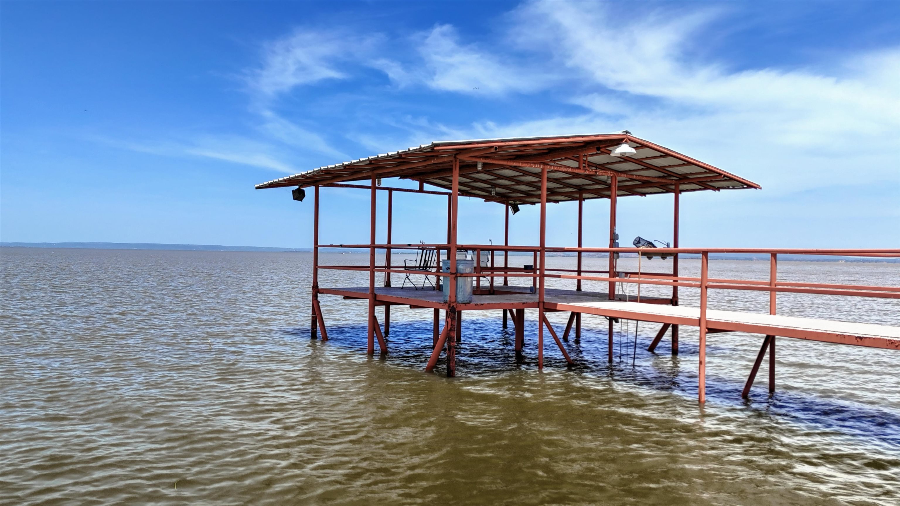 1504 Rr 261 - Main Home Buchanan Dam Buchanan Dam, TX 78609 - Photo 30 of 30 a view of chairs and umbrella in the patio