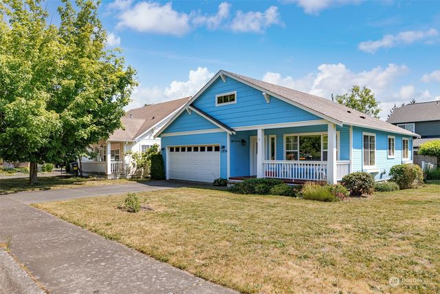 a view of a balcony with wooden floor