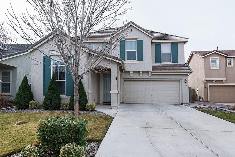 1716 Cavern Drive Reno, NV 89521 - Photo 1 of 1 a front view of a house with garden