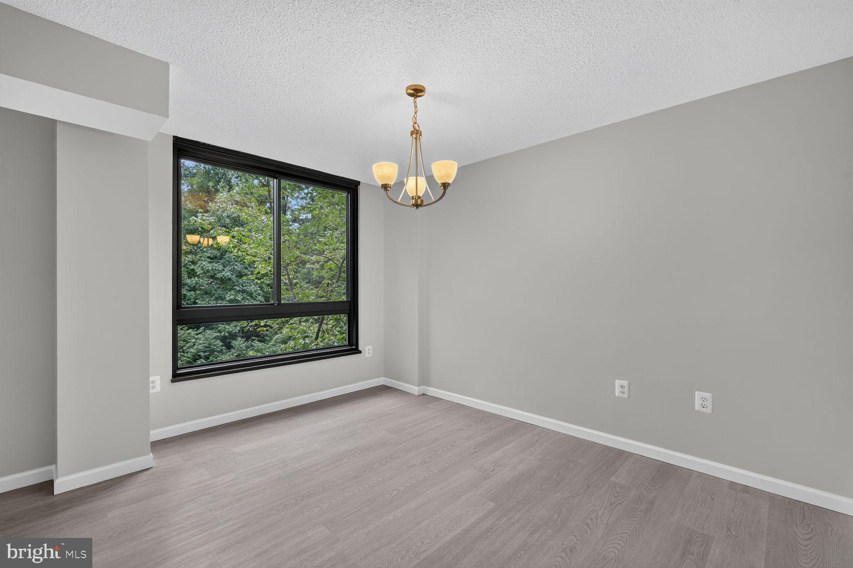 1808 Old Meadow Road, Unit 601 McLean, VA 22102 - Photo 6 of 19 Dining Room open to The Living Room