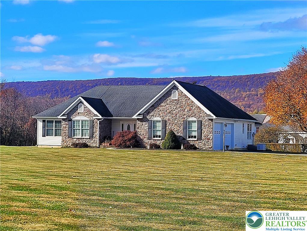 8732 Allemaengel Road New Tripoli, PA 18066 - Photo 1 of 1 a view of a house with a big yard