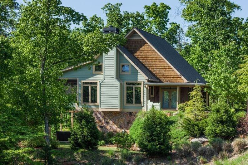 235 Mountain Lake Road Ellijay, GA 30540 - Photo 1 of 1 a view of a house with a yard and potted plants
