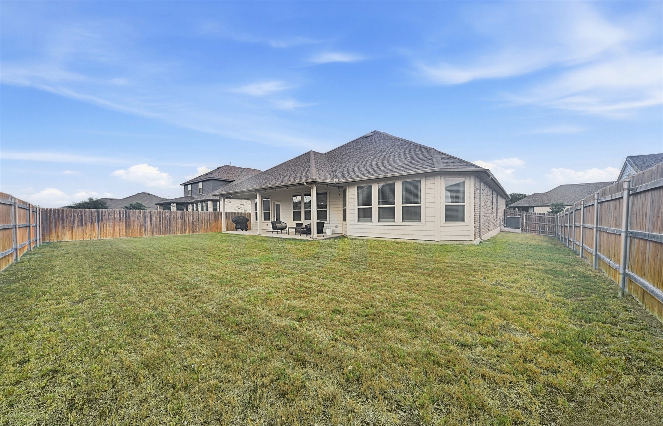 903 Simmental Loop Hutto, TX 78634 - Photo 24 of 26 Spacious backyard with plenty of room to enjoy the outdoors