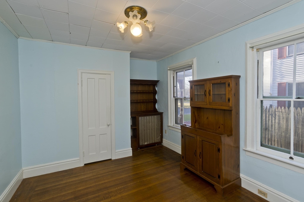 115 Thompson Street Springfield, MA 01109 - Photo 15 of 39 a view of a hallway with wooden floor and closet