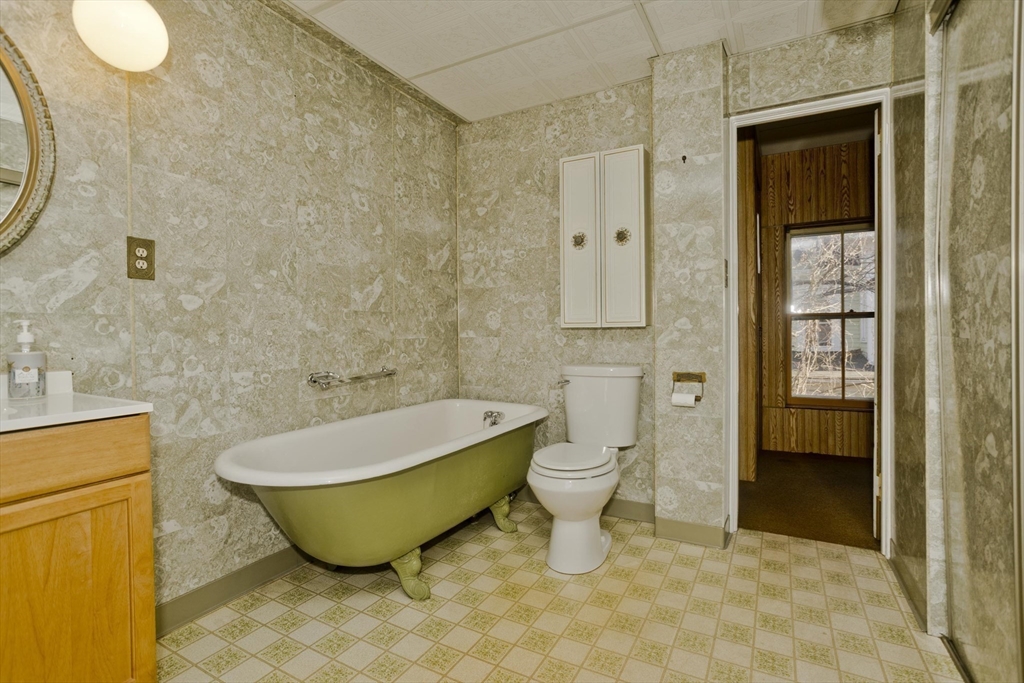 115 Thompson Street Springfield, MA 01109 - Photo 28 of 39 a bathroom with a sink toilet and shower