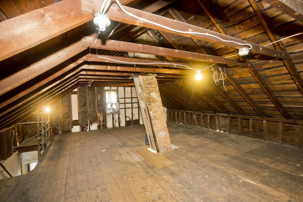 115 Thompson Street Springfield, MA 01109 - Photo 37 of 39 a view of a room with wooden floor