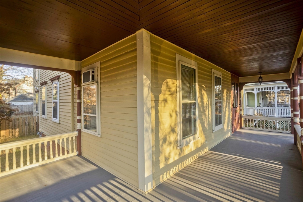 115 Thompson Street Springfield, MA 01109 - Photo 5 of 39 a view of a porch with wooden floor