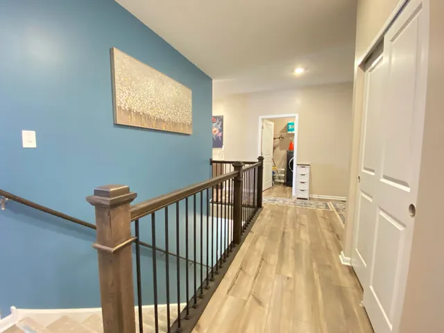 a view of hallway with stairs