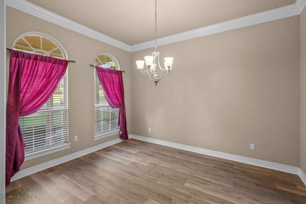 1940 Honeytree Trail Haughton, LA 71037 - Photo 11 of 21 a view of a livingroom with wooden floor and windows