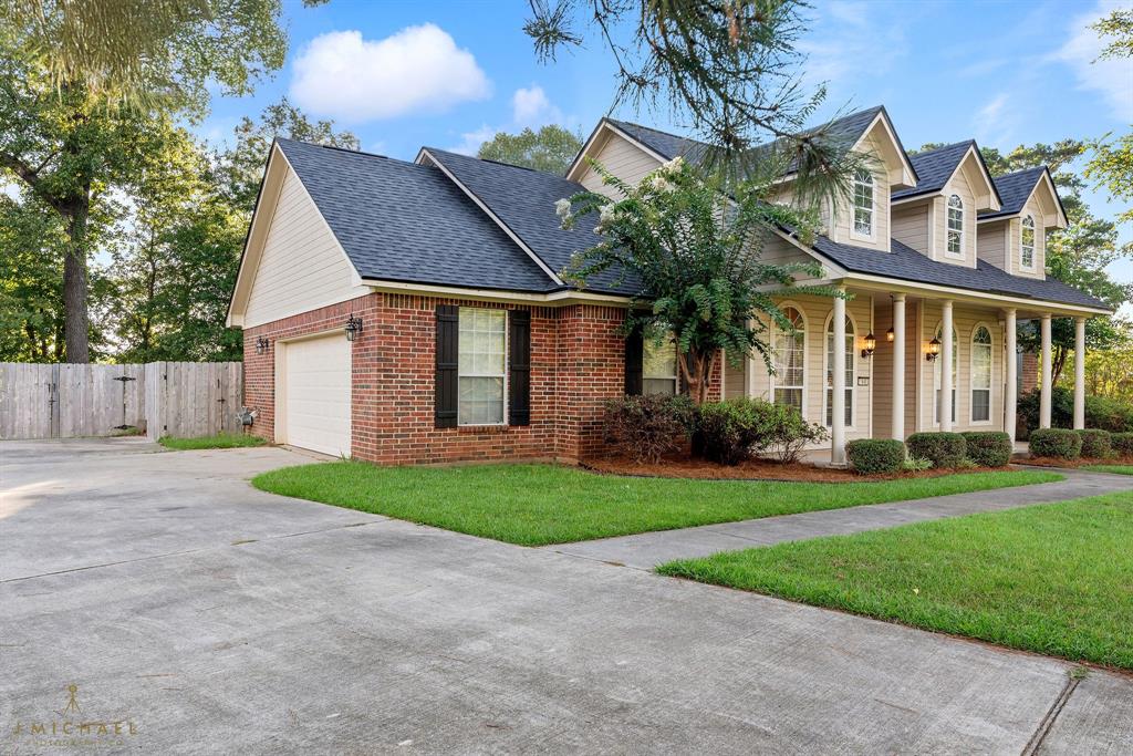 1940 Honeytree Trail Haughton, LA 71037 - Photo 4 of 21 front view of house with a yard