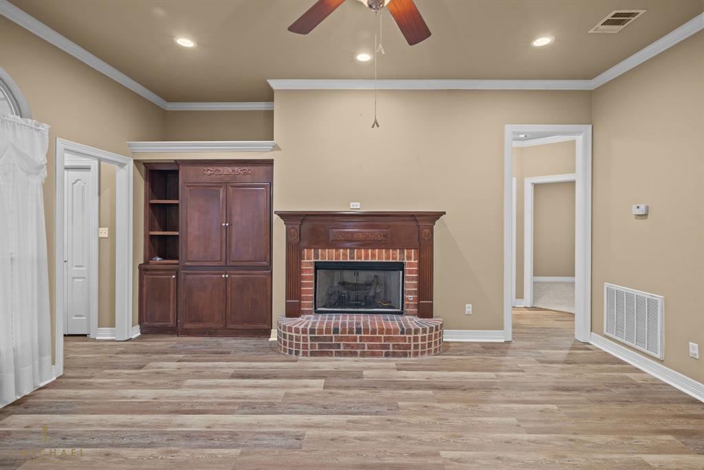 1940 Honeytree Trail Haughton, LA 71037 - Photo 9 of 21 a view of a livingroom with a fireplace