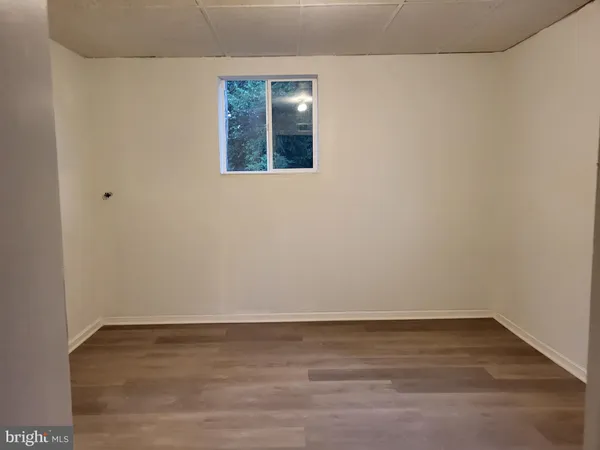 a bathroom with a toilet a sink and bathtub