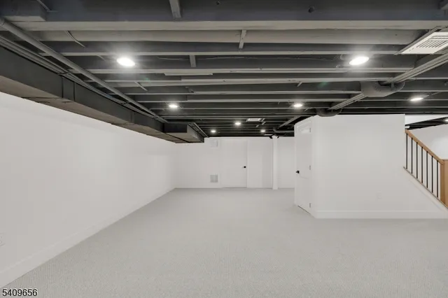 a view of a wooden deck and a yard