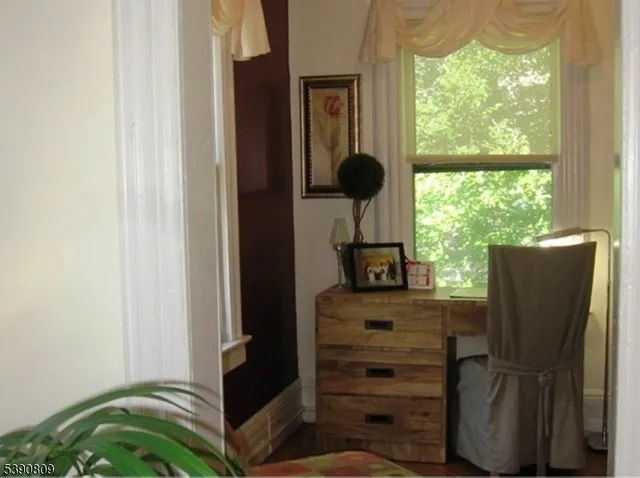 a view of hallway with a window