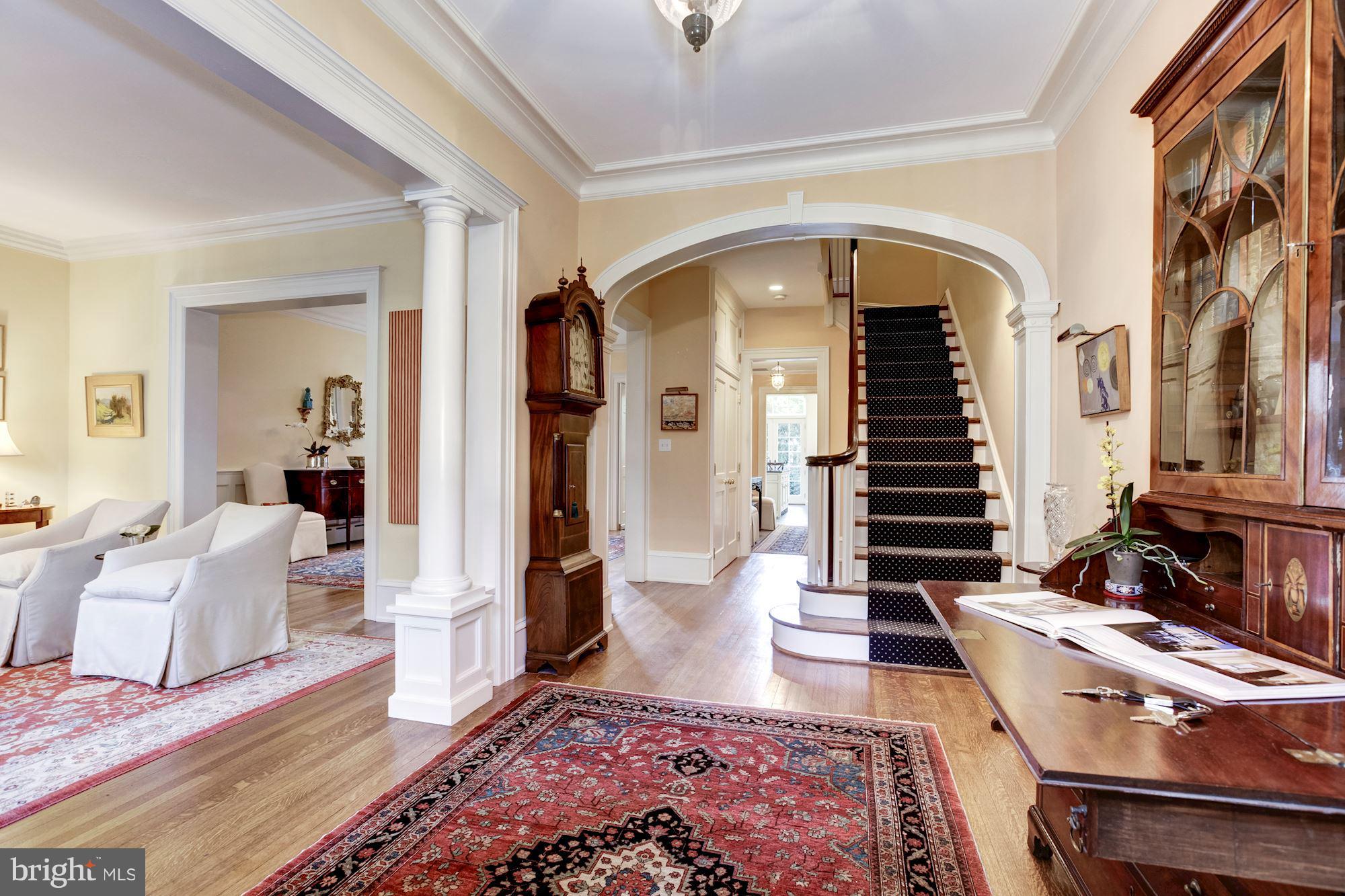 2326 California Street Northwest Washington, DC 20008 - Photo 2 of 30 a living room with furniture and a fireplace