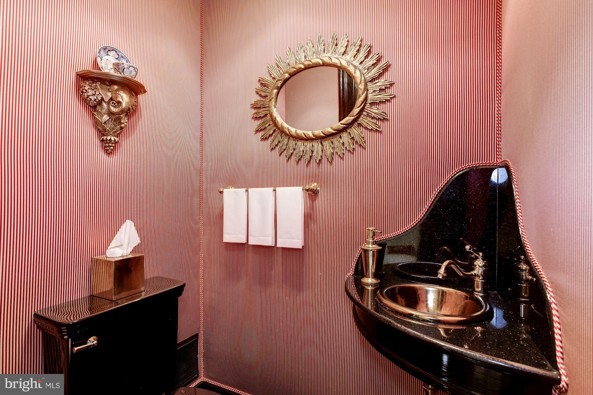 2326 California Street Northwest Washington, DC 20008 - Photo 12 of 30 a bathroom with a sink and a mirror