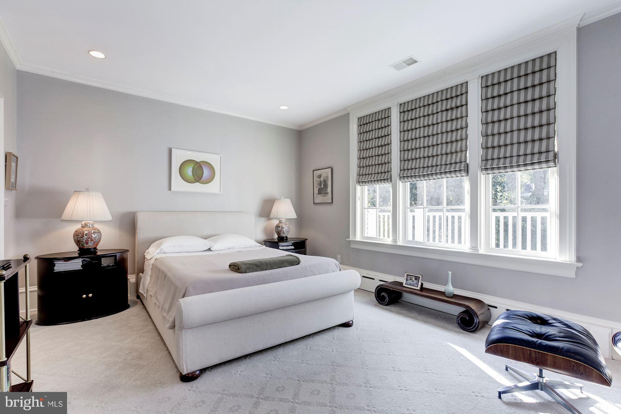 2326 California Street Northwest Washington, DC 20008 - Photo 14 of 30 a bedroom with a bed and a window