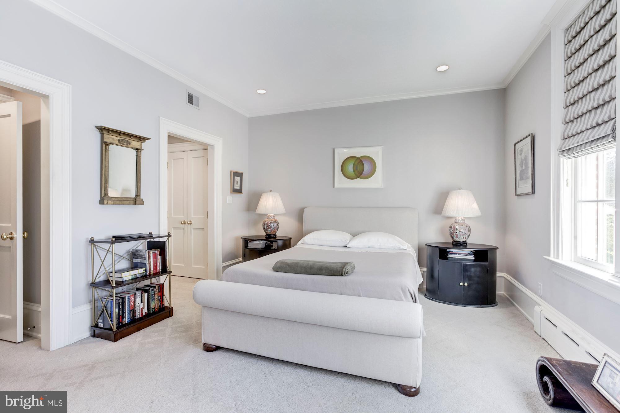 2326 California Street Northwest Washington, DC 20008 - Photo 15 of 30 a bedroom with a bed and a window