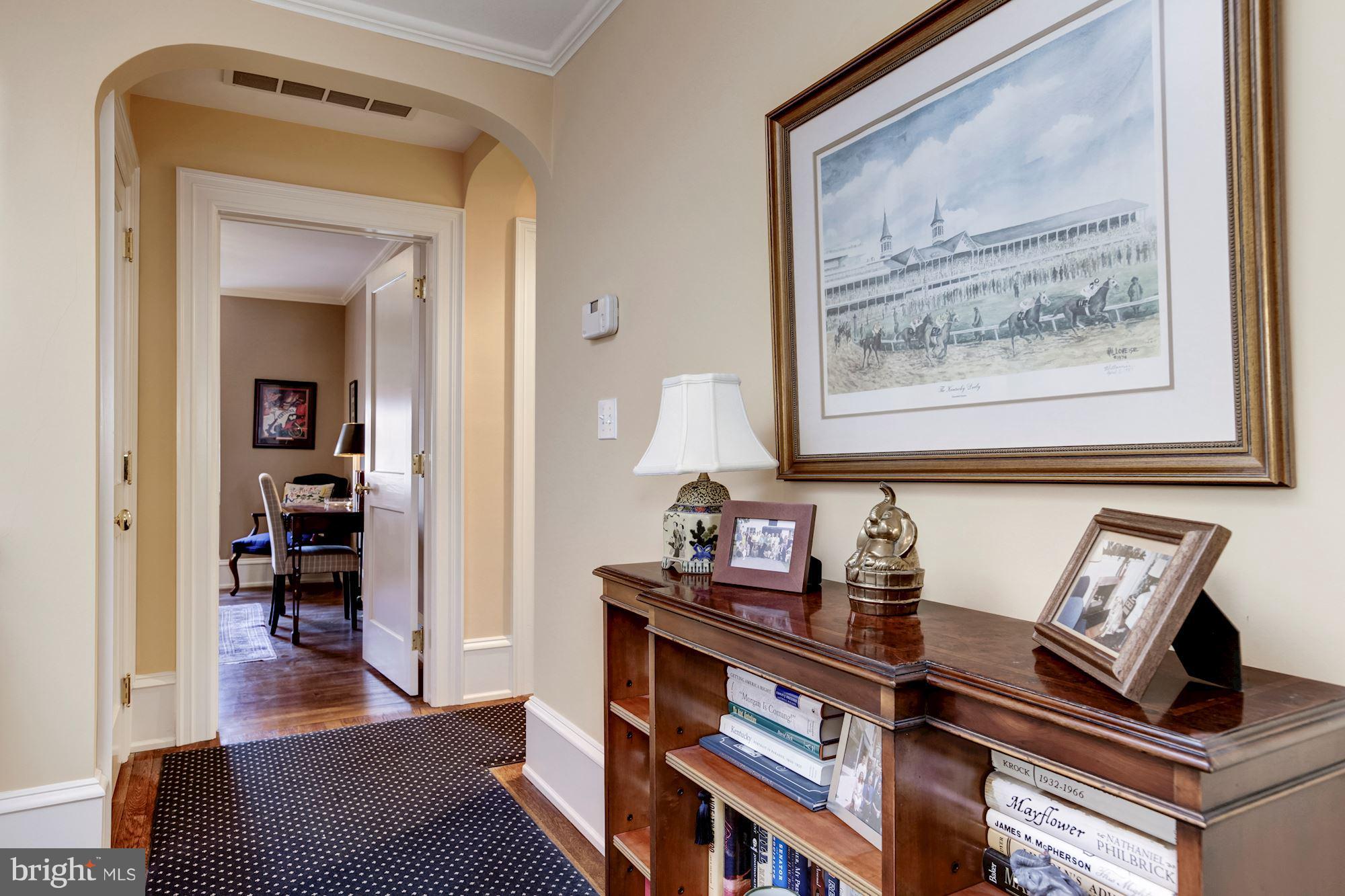 2326 California Street Northwest Washington, DC 20008 - Photo 23 of 30 a living room with furniture and wooden floor