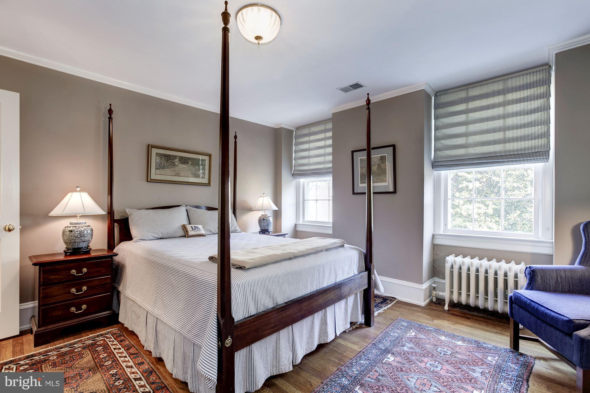 2326 California Street Northwest Washington, DC 20008 - Photo 24 of 30 a bedroom with a bed and a window