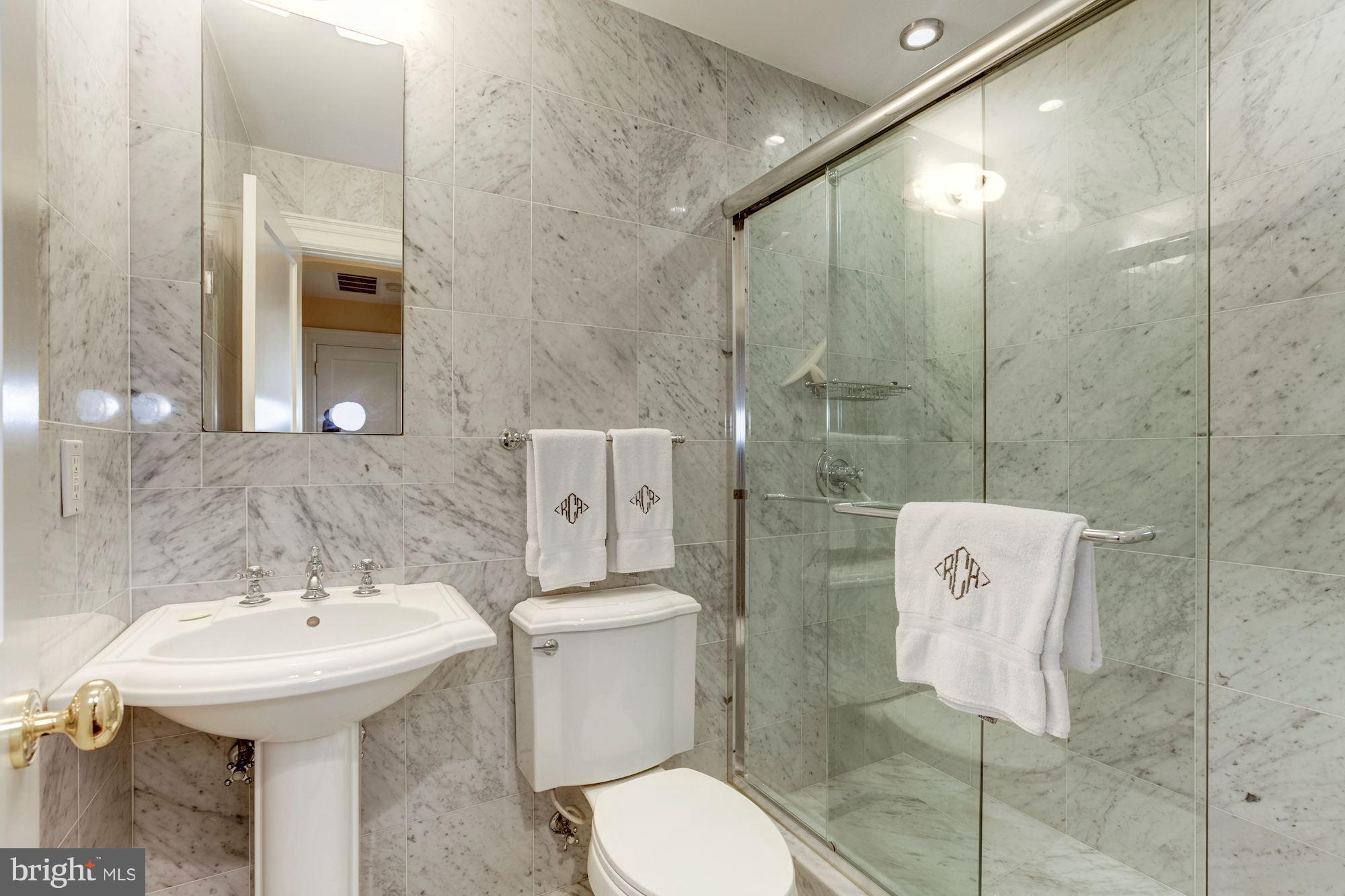 2326 California Street Northwest Washington, DC 20008 - Photo 26 of 30 a bathroom with a sink toilet and shower
