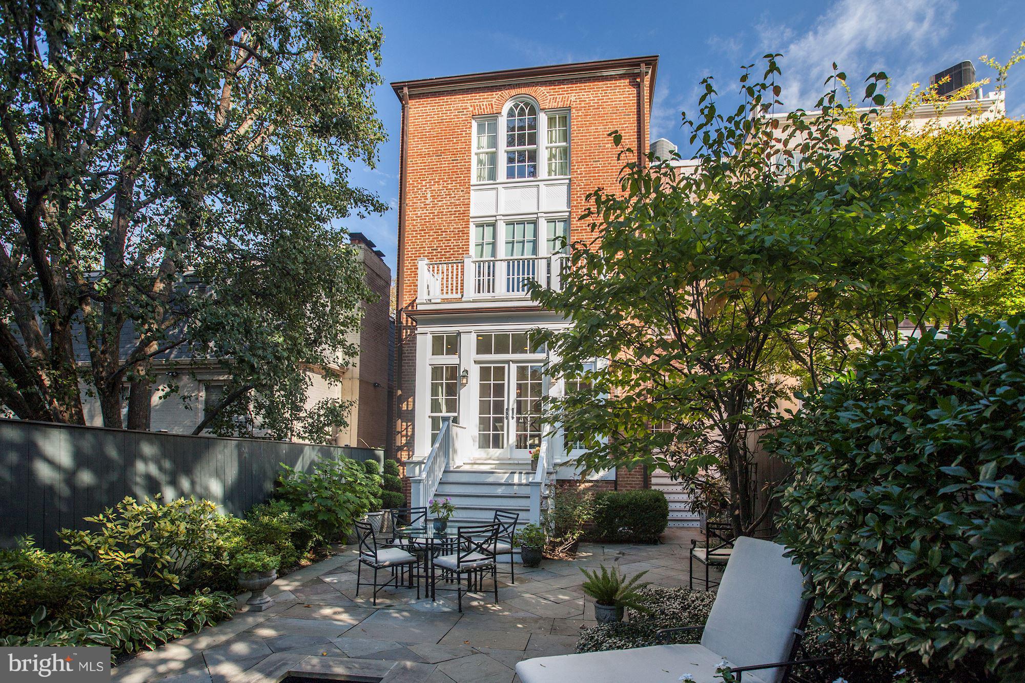 2326 California Street Northwest Washington, DC 20008 - Photo 27 of 30 a front view of a house with a yard