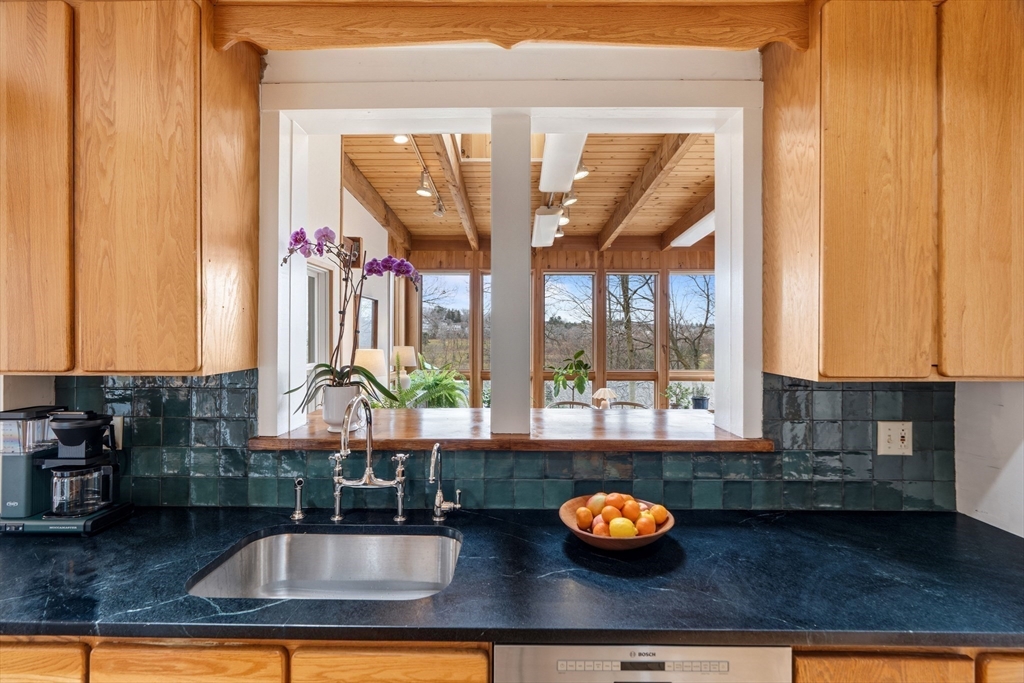 61 Huntington Road Newton, MA 02458 - Photo 18 of 41 a kitchen with a sink and a window