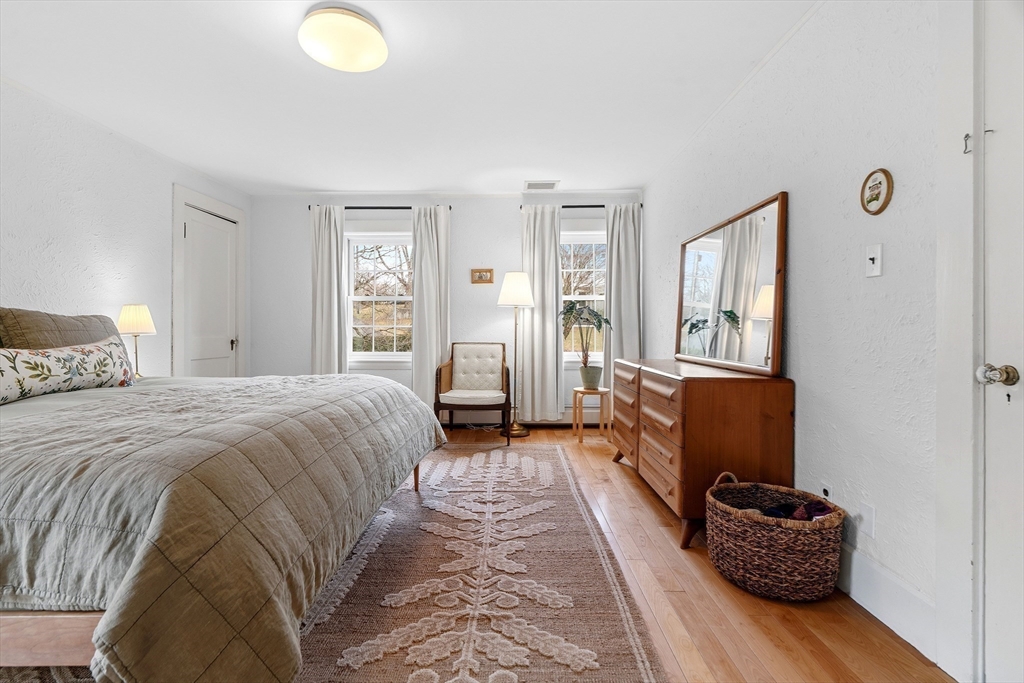 61 Huntington Road Newton, MA 02458 - Photo 22 of 41 a bedroom with a bed and a large window