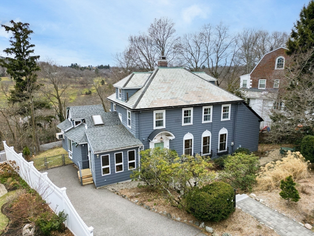 61 Huntington Road Newton, MA 02458 - Photo 39 of 41 aerial view of a house with a yard and balcony