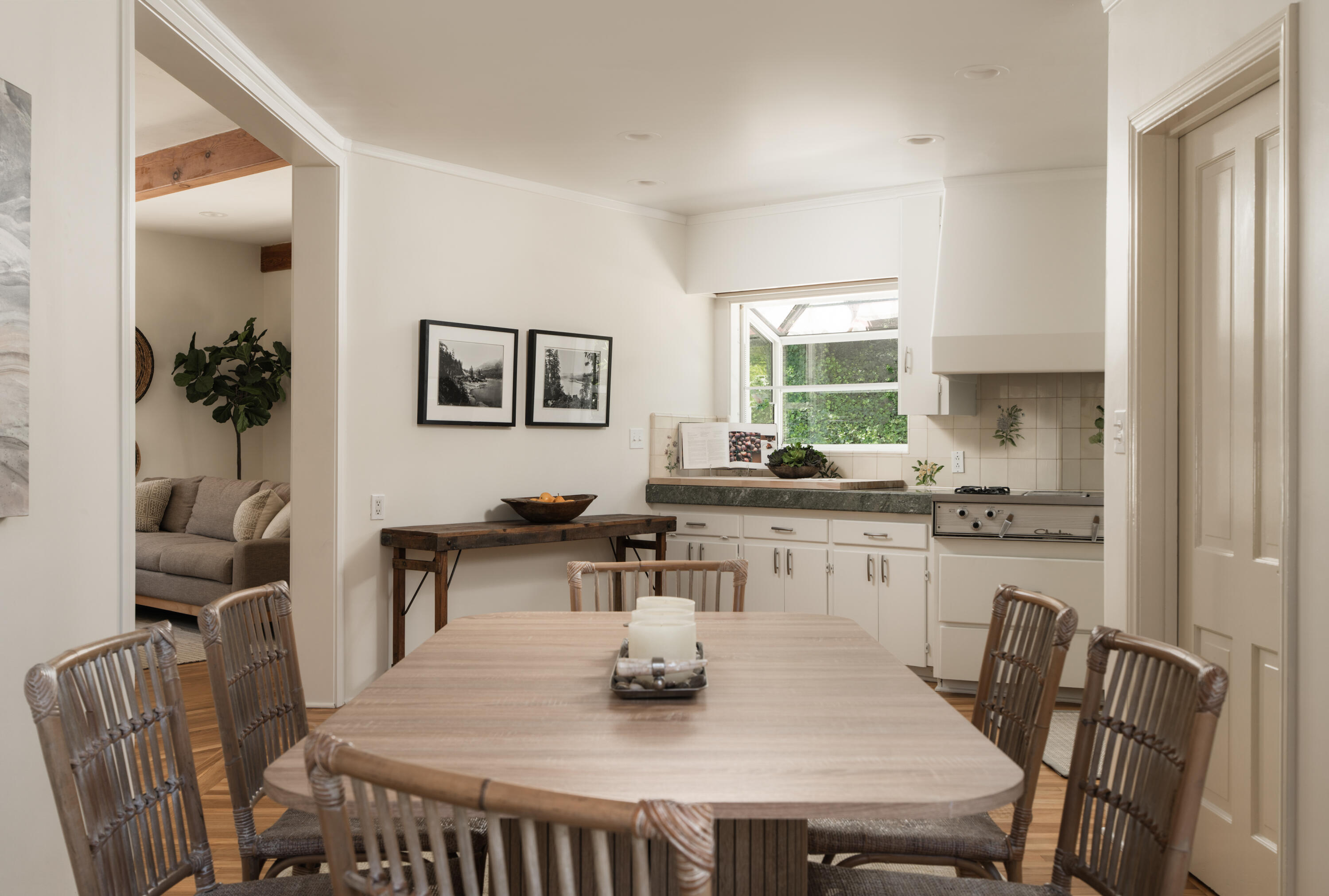 939 Arcady Road Santa Barbara, CA 93108 - Photo 5 of 28 a kitchen with stainless steel appliances a dining table and chairs