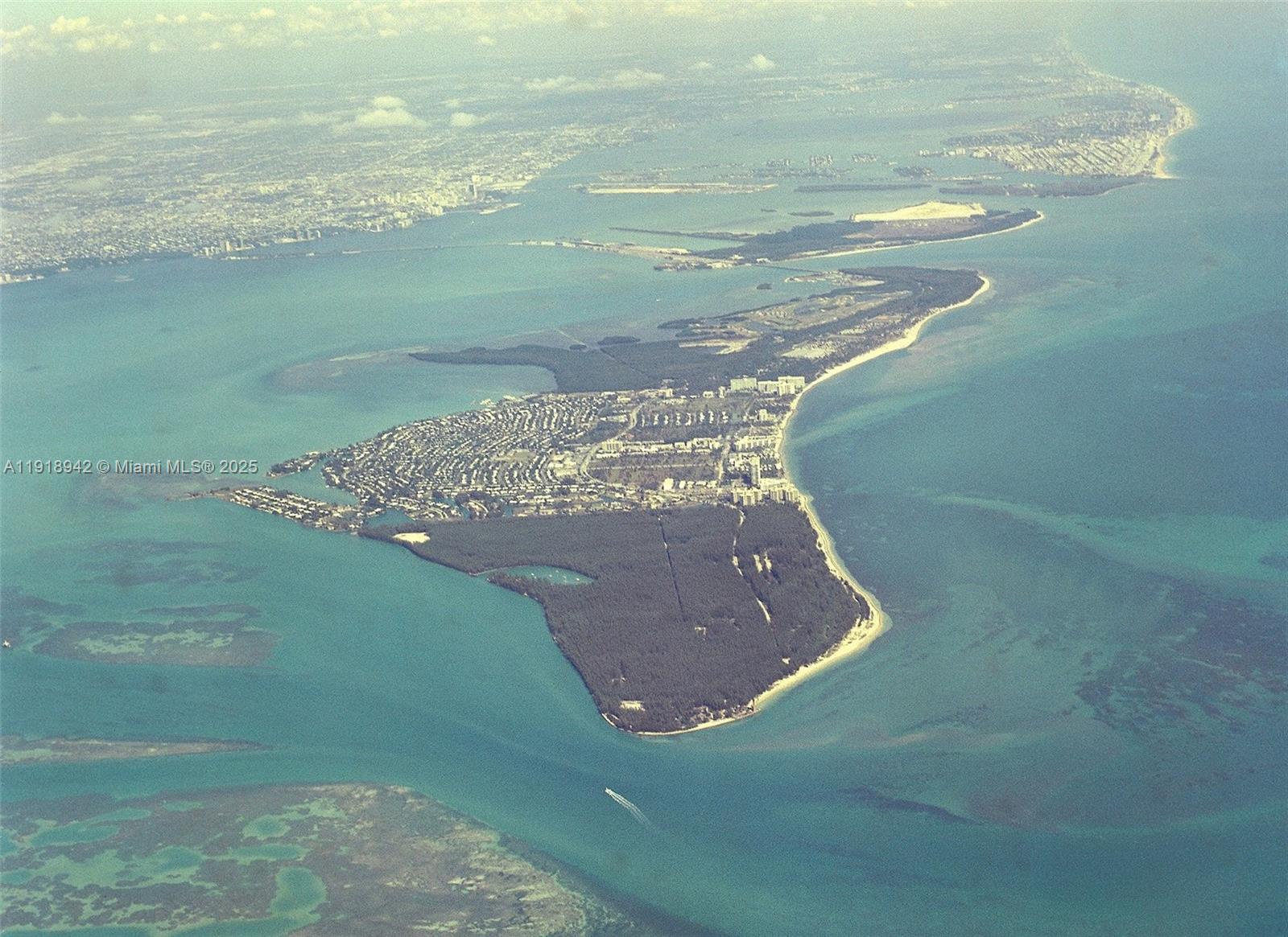 201 Galen Drive, Unit 215W Key Biscayne, FL 33149 - Photo 18 of 18 a view of a water heater of a water with a floor to ceiling window