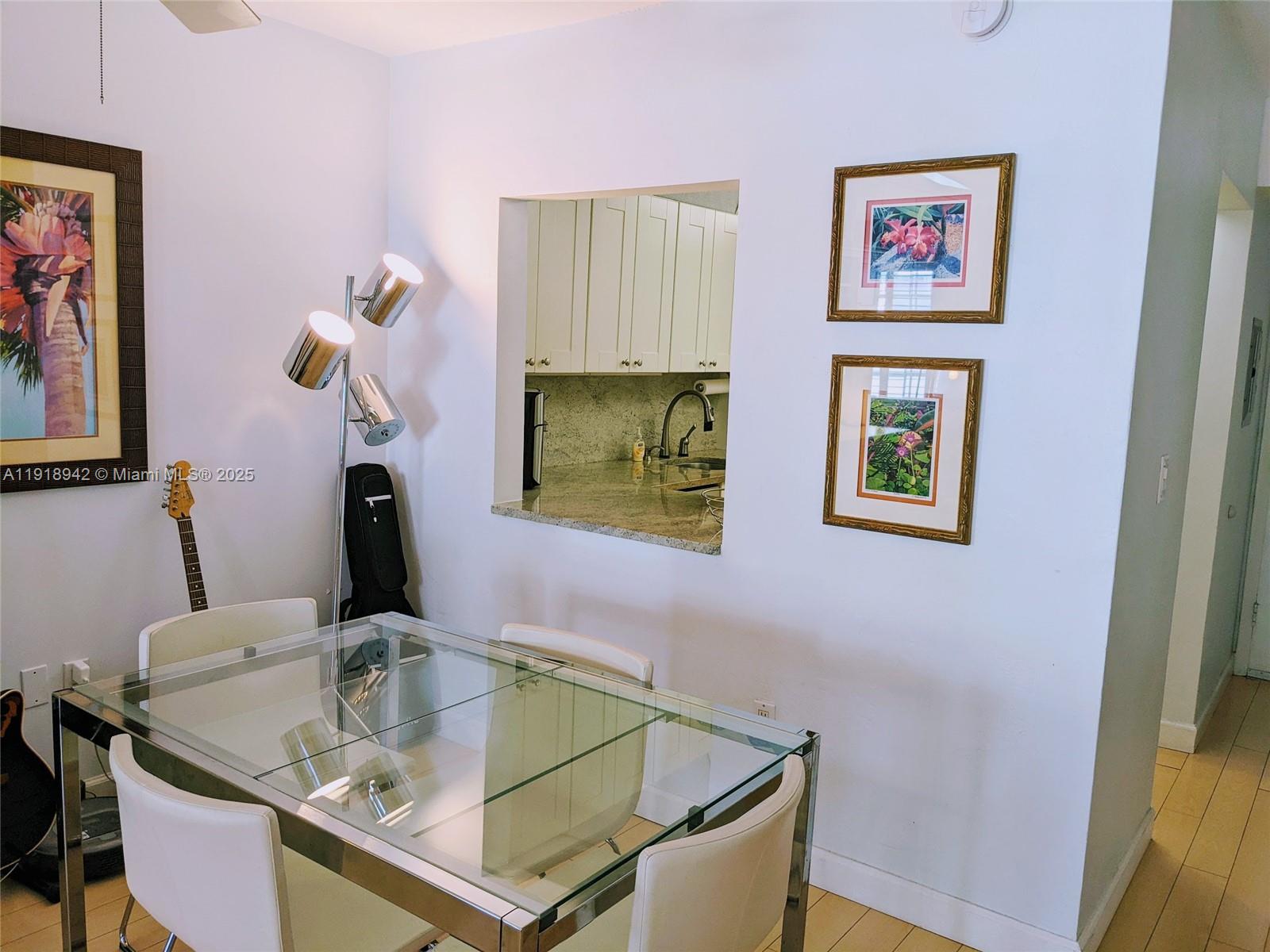 201 Galen Drive, Unit 215W Key Biscayne, FL 33149 - Photo 4 of 18 a bathroom with a sink and a mirror