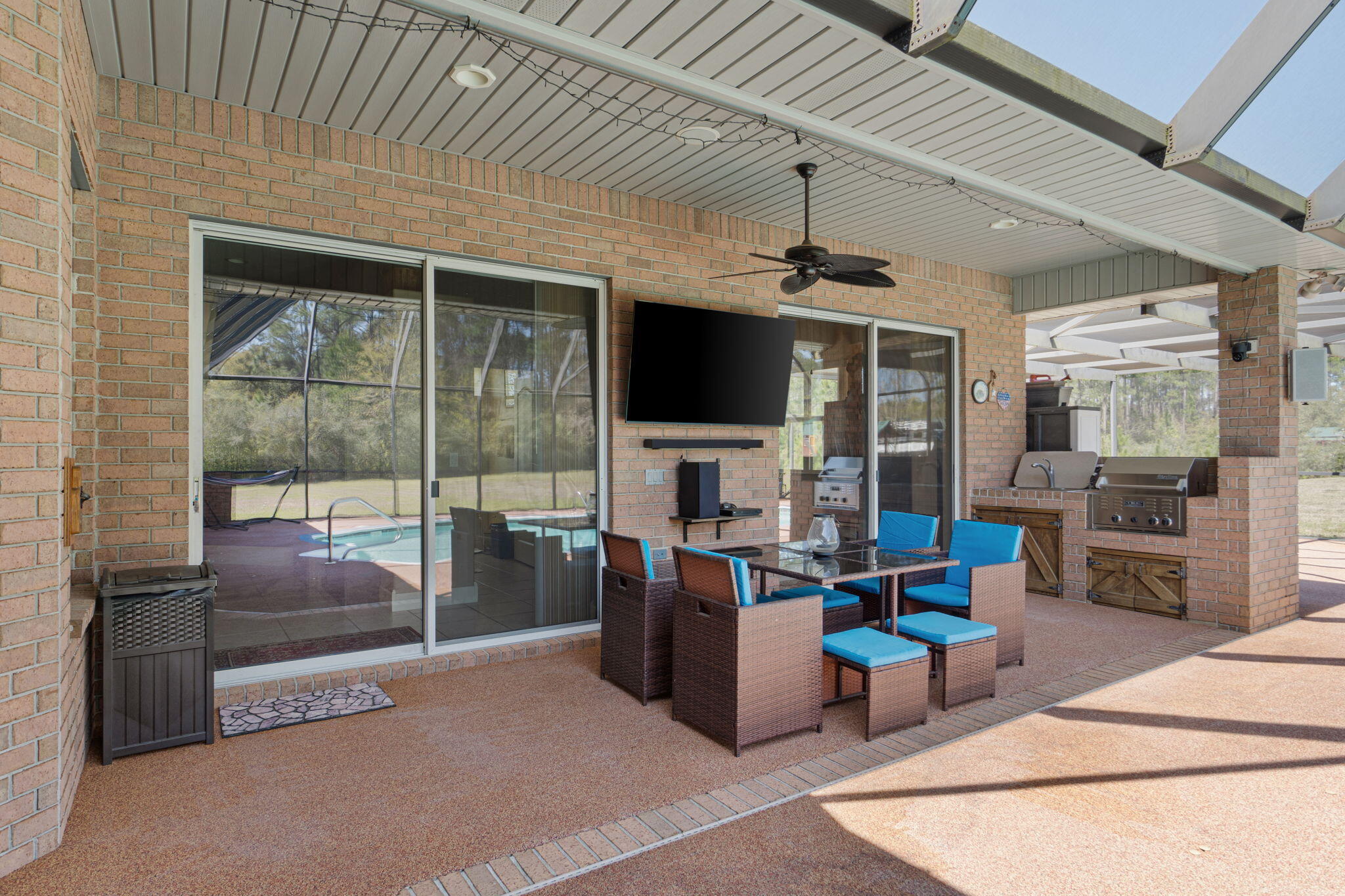 6774 Quintette Road Pace, FL 32571 - Photo 13 of 62 Outdoor kitchen, tv area