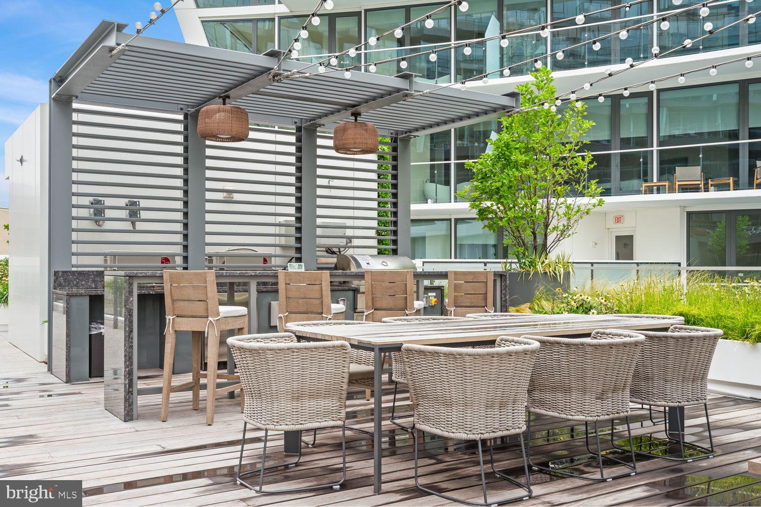 601 Wharf Street Southwest, Unit 301 Washington, DC 20024 - Photo 40 of 53 a view of an outdoor space with seating area