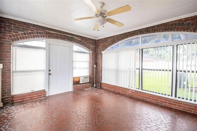 a bathroom with a tub and a sink
